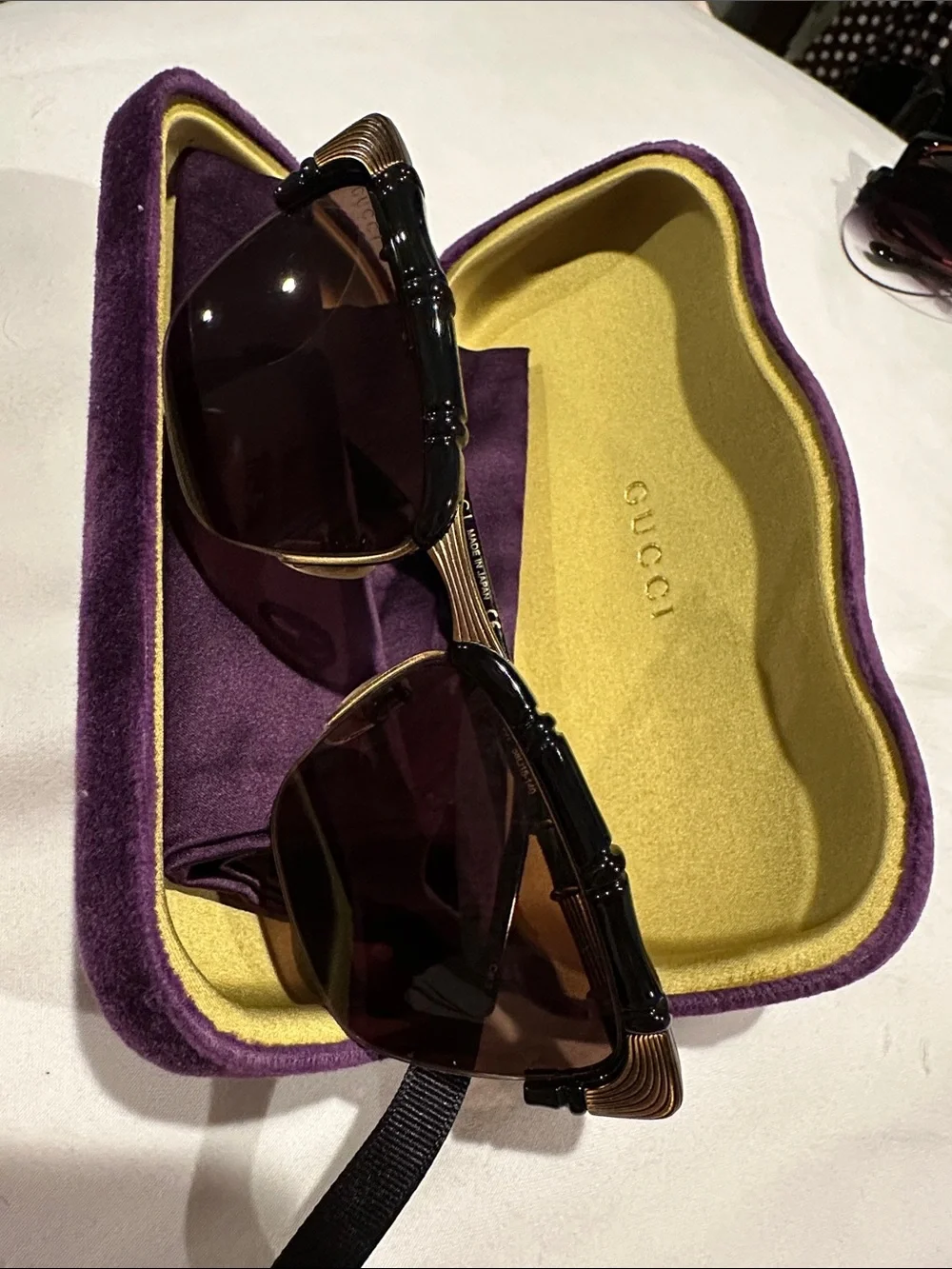 Limited edition Gucci Black Sunglasses with Gold Accents in Yellow & Purple Case